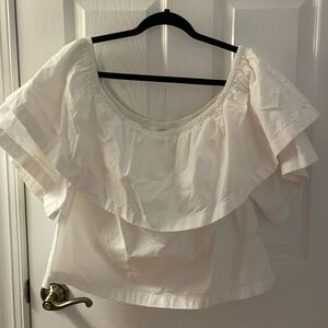White off the shoulder top. Size Large. Super cuter with jeans, shorts and skirt